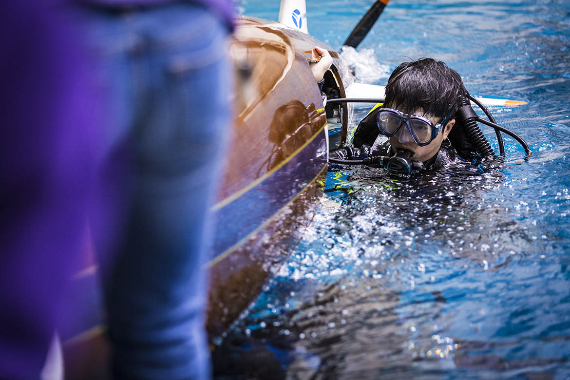 Scuba diver coming out of the water with the HPS