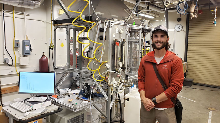 Brian Pinkard standing in a lab