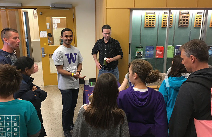 Mukherjee leads a demo at Engineering Discovery Days with ME affiliate assistant professor Eric Rombokas.