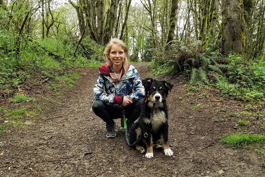 Payne outdoors with her puppy