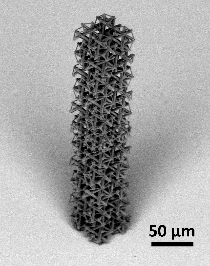 A two-photon lithography tetrakaidecahedron tensegrity tower