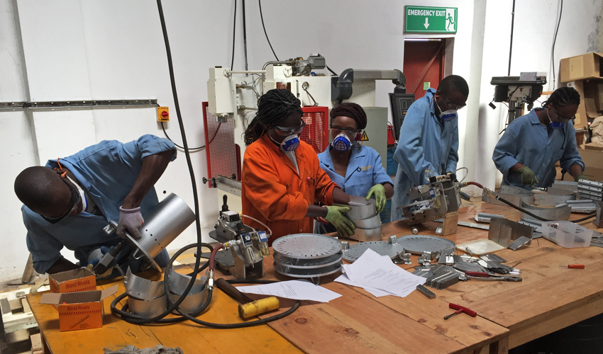 Workers at the BURN factory in Kenya