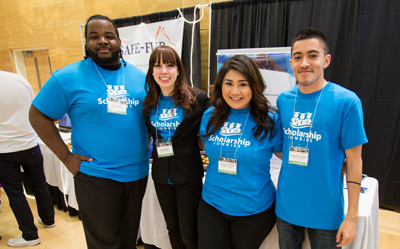 David Coven standing with fellow Scholarship Junkies volunteers