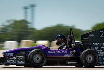 photo, Patrick Sodt driving Formula SAE car at Lincoln competition