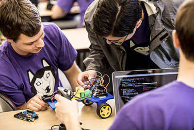 Students with laptop and mini-rover