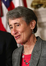 Sally Jewell at podium accepting nomination, with president Obama. Photo: CHIP SOMODEVILLA / GETTY IMAGES