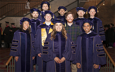 Group photo of graduate students at graduation