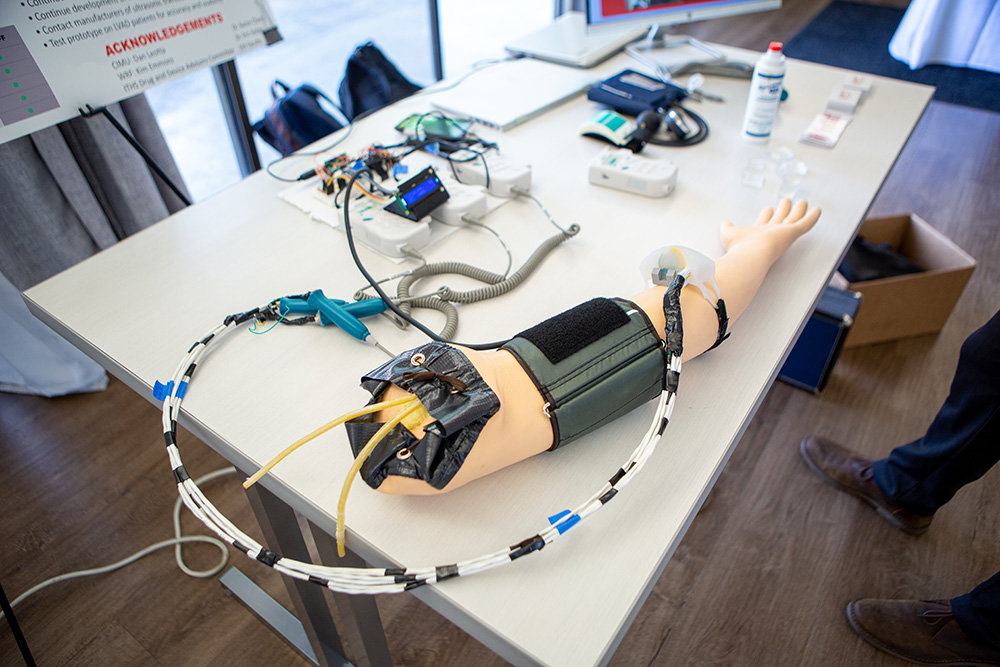 A prosthetic arm attached to an equipment