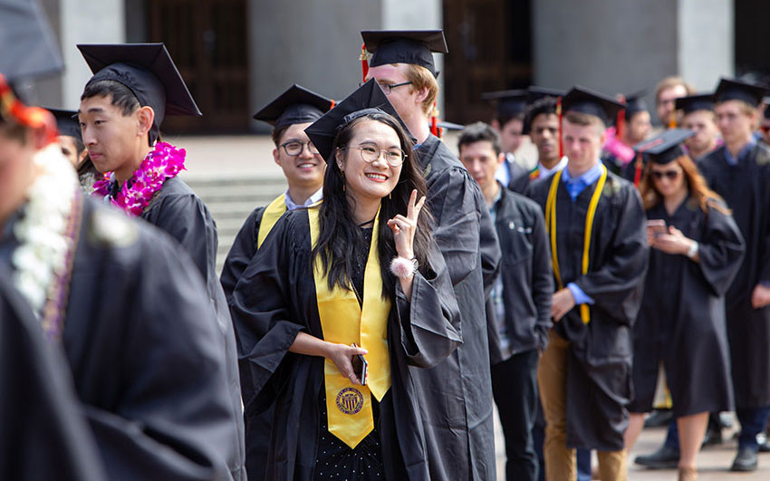 Stuents standing in line at graduation