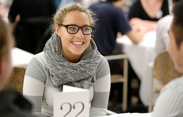 students sitting at tables