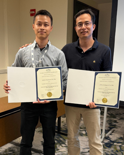Jinhua (Toby) Ouyang and Xu Chen stand next to each other holding their ASME awards.