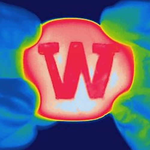 The colorful thermal imaging of a material with the letter W on it is shown.