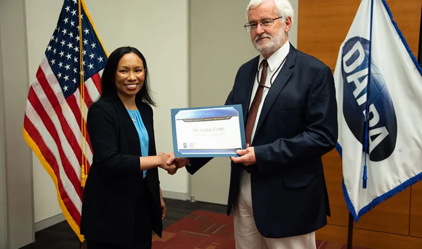 Corie Cobb receiving award