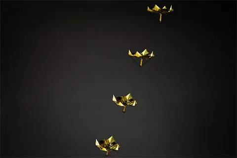 a group of small robotic devices in the air