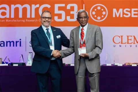 Ramulu Mamidala accepting an award