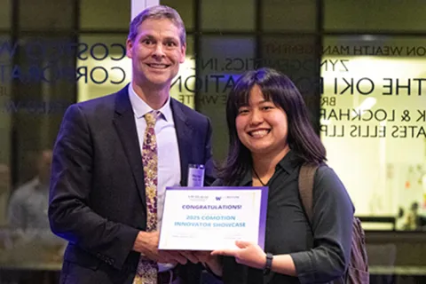 Michael Bailey receiving an award