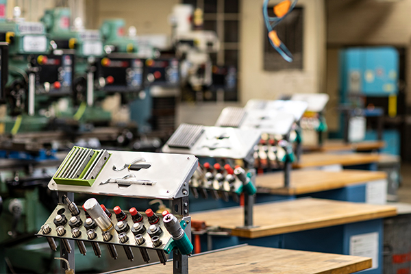 Wide shot of ME machine shop with various tools