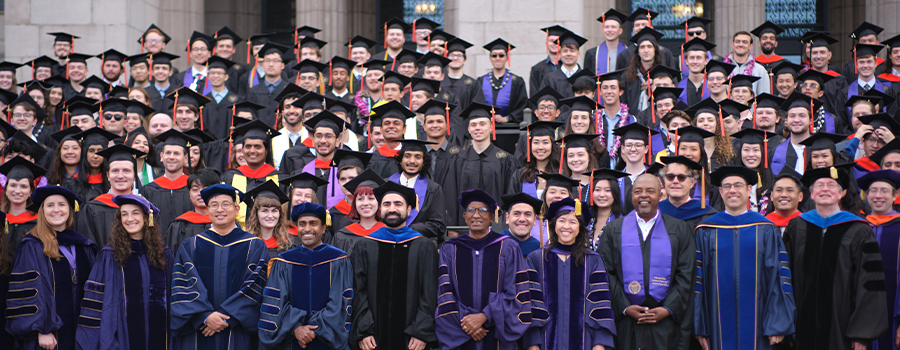 a group of people in graduation gowns