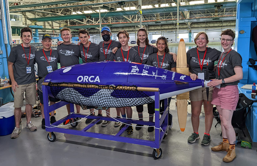 The UW Human Powered Submarine team members with their submarine at the European International Submarine Races competition.