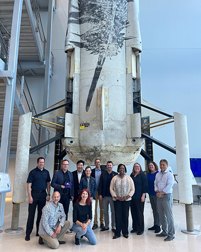 A group of External Advisory Board members at the Blue Origin facility in Florida.