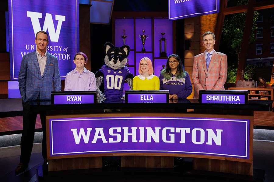 Three UW students and Jeopardy's co-hosts
