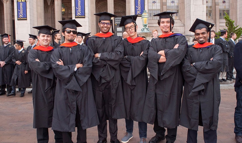 Graduates of ME’s master’s program wear orange hoods at the department’s annual graduation ceremony.