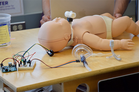 Infant CPR Manikin on a table
